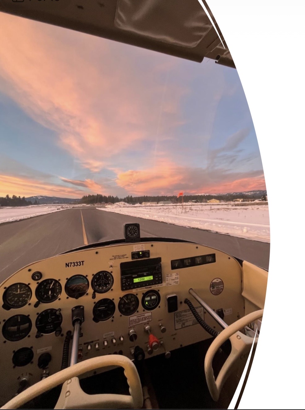Sunrise view down the McCall runway from the cockpit of club Cessna 172 N7333T